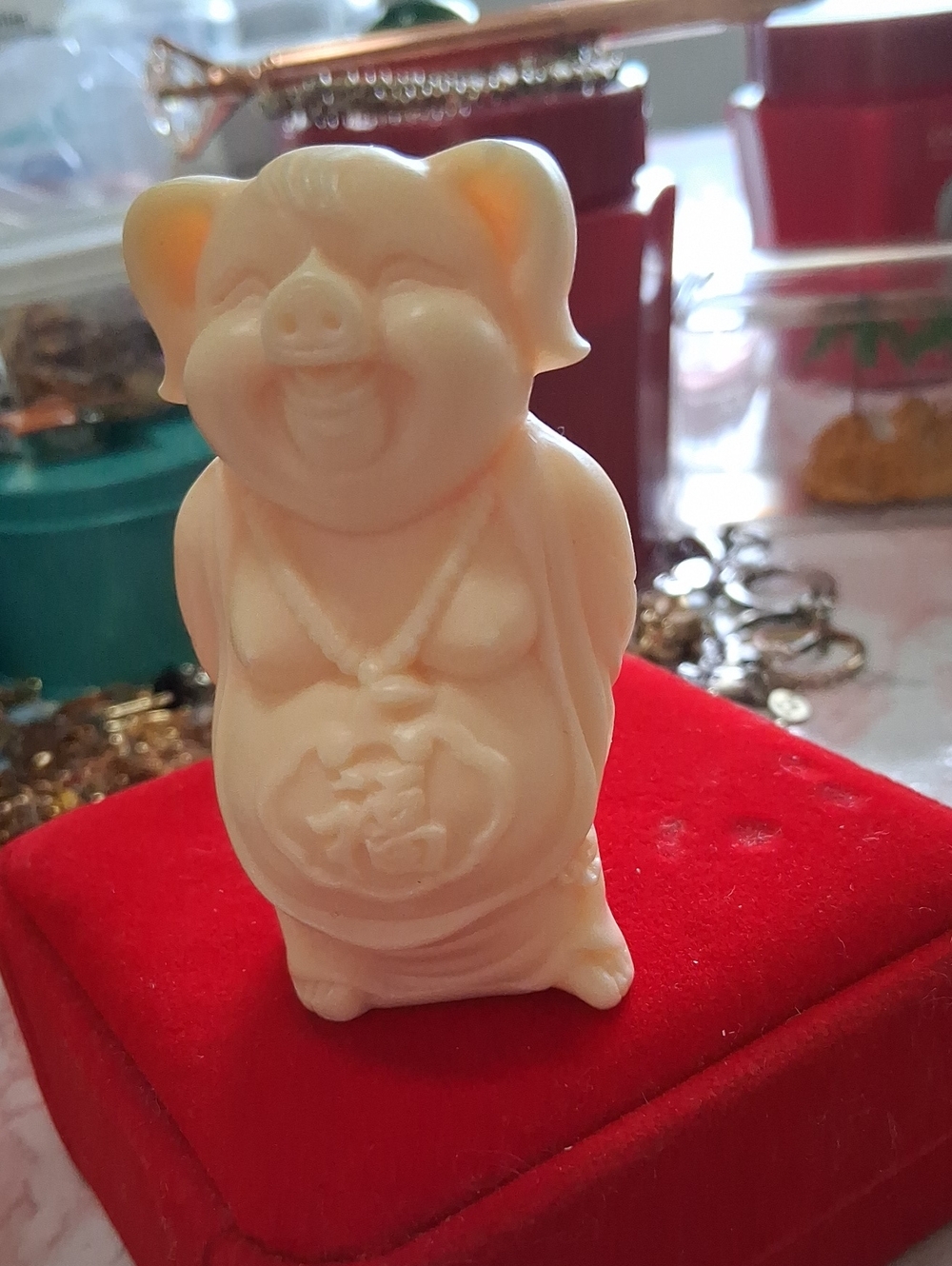 Source Unknown Cream Pig Figurine on Red Base